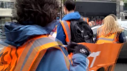 Motorist running over the foot of a Just Stop Oil activist