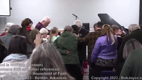 PASTOR BOB JOYCE {ELVIS}PRAYS OVER GENE HO @ CHRISTMAS EVE SERVICE