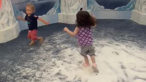 Playing with her new friend