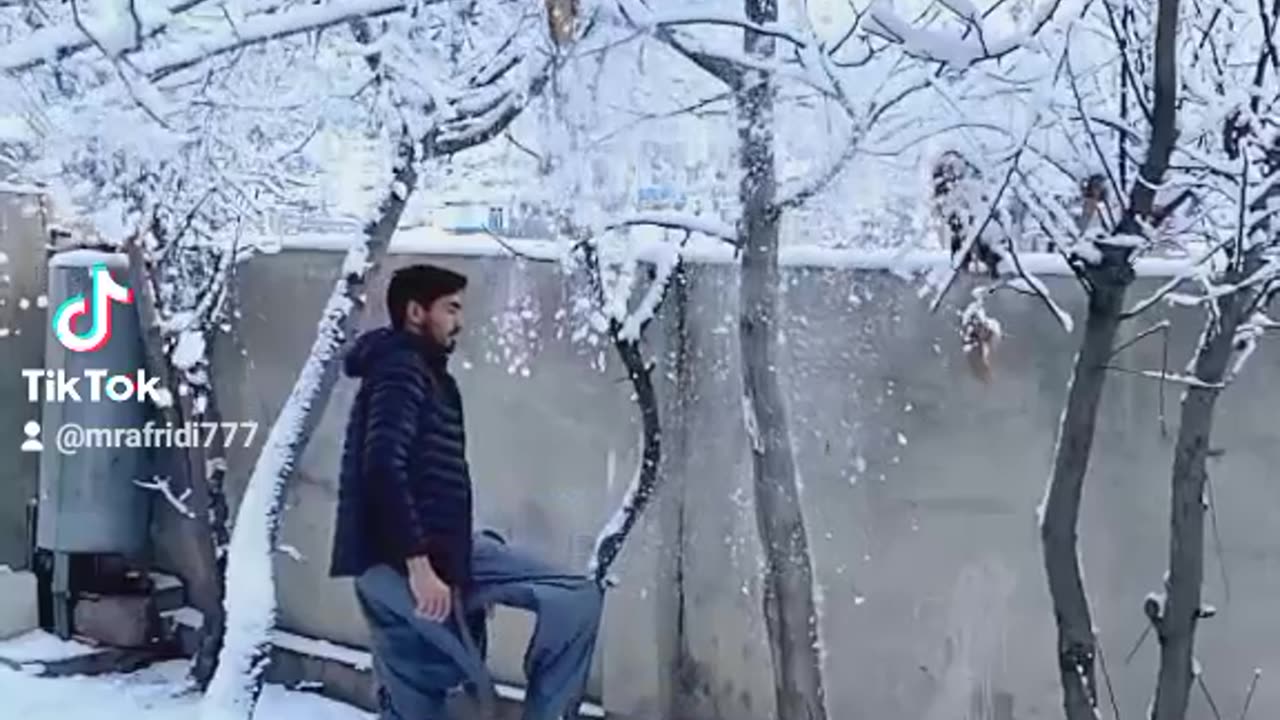 Enjoying in snow falling.