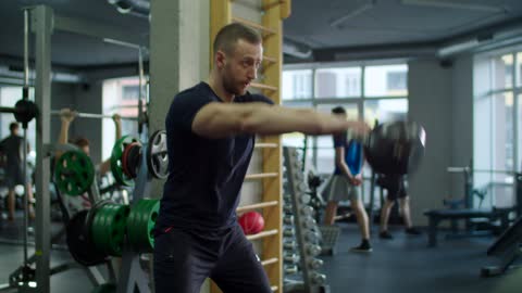 Man exercising with a kettlebell