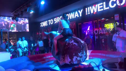 GIRL TAKE ON THE BULL! Benidorm Bull Ride. Mechanical Bull EPIC FAIL