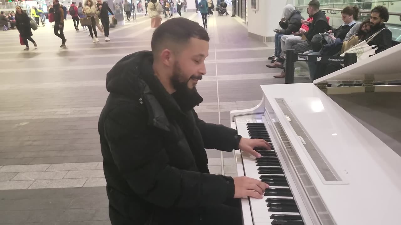 Dude Plays Andrew Tate Song on Piano in Public