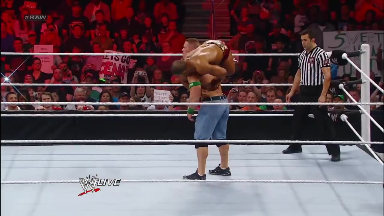 wrestling between john cena and roman