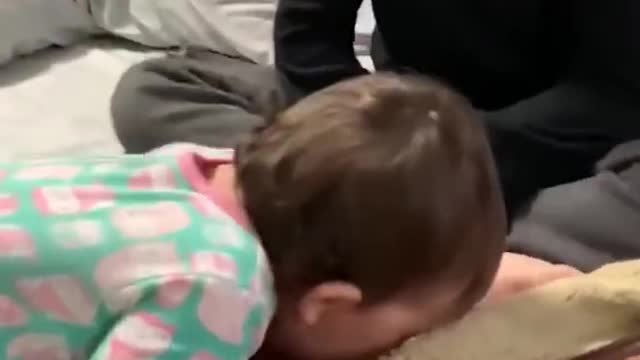 Cute Baby Want To Bite He's Brother's Feet