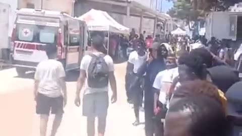 Queues on the Italian island of Lampedusa as another 4000 wash up from north Africa.