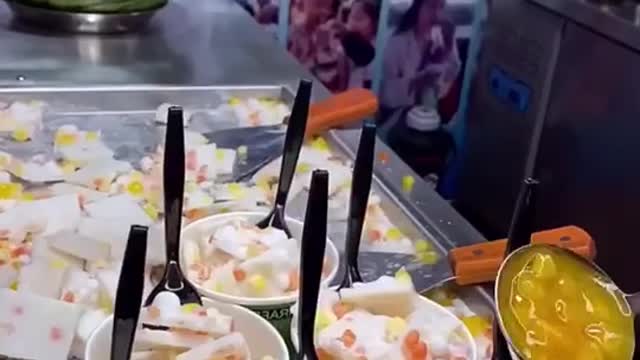 Stir-fried yogurt with colored jelly.