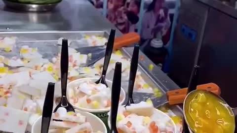 Stir-fried yogurt with colored jelly.