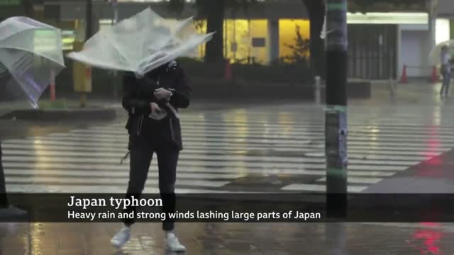 Japan hit by biggest typhoon in decades - BBC News