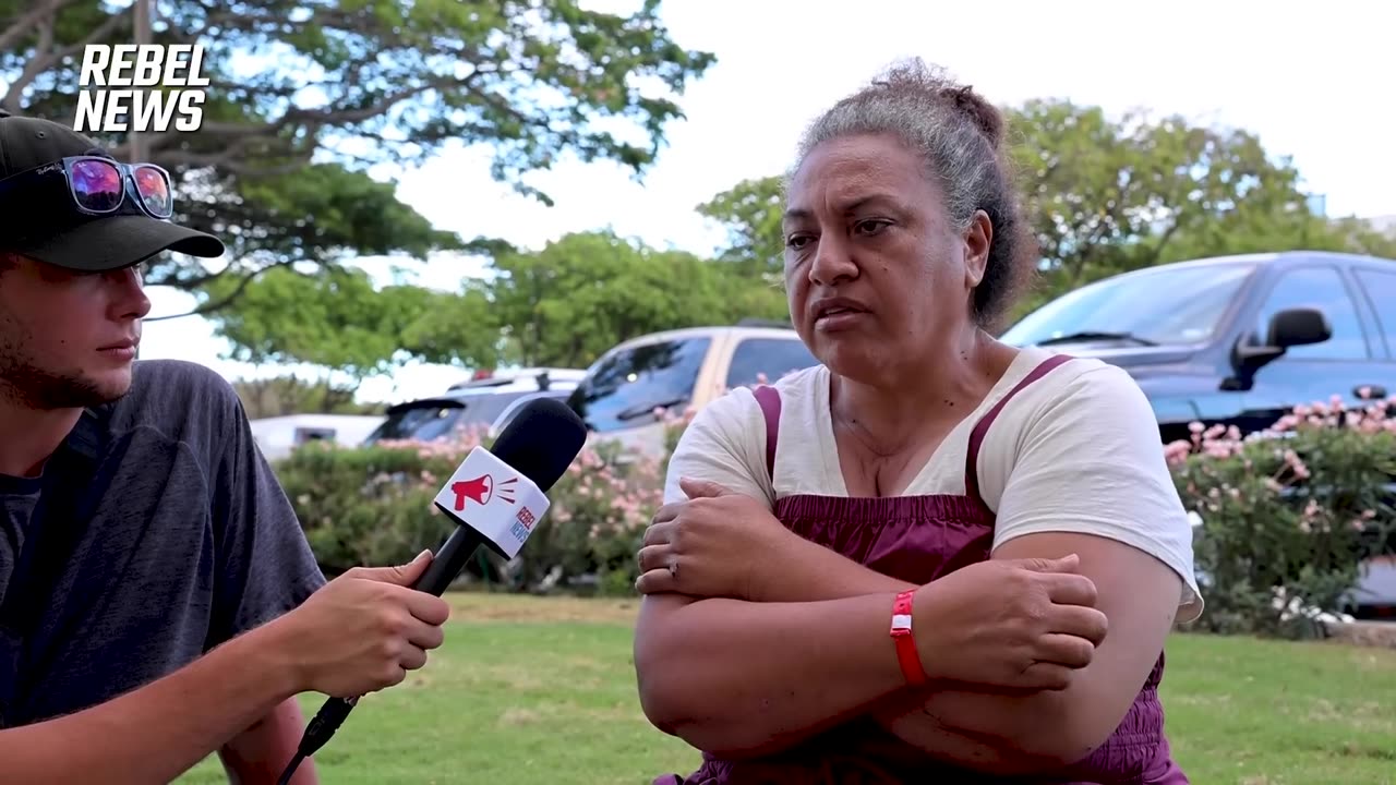 Rebel News - Local woman escapes Lahaina fire by jumping into ocean!