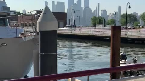 Yachts with the Freedom Tower in the background