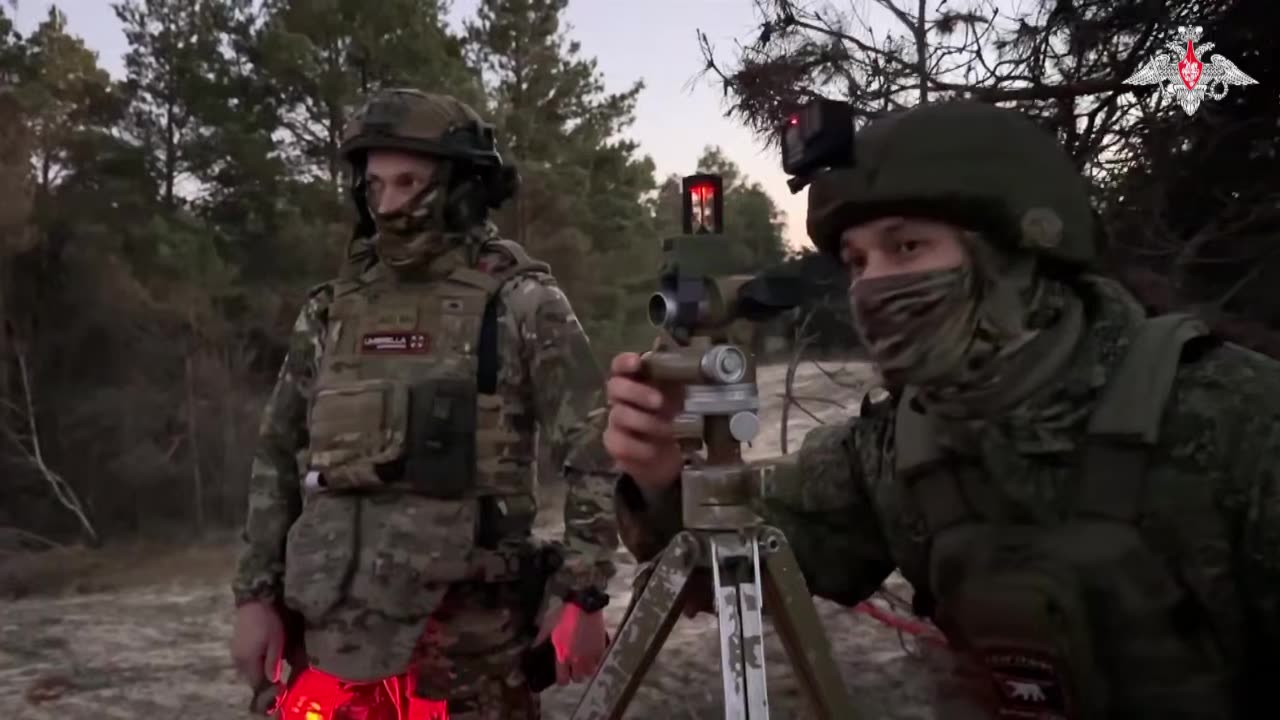 Marine artillerymen take positions at night