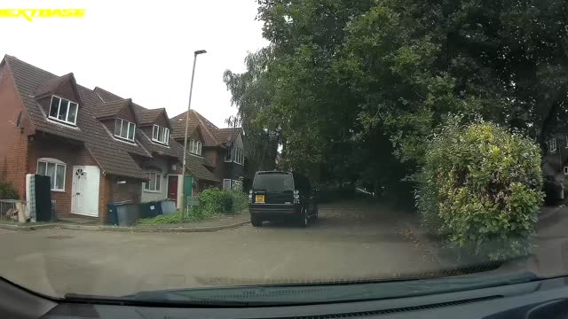 Scootering Kid Shoots Out In Front Of Car