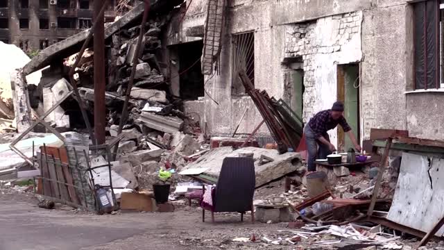 'I'm still in shock': Mariupol survivor picks through remains