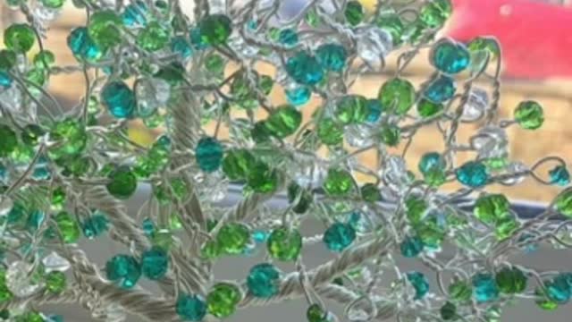 Created beaded craft/artistic home decoration with jewellery designs