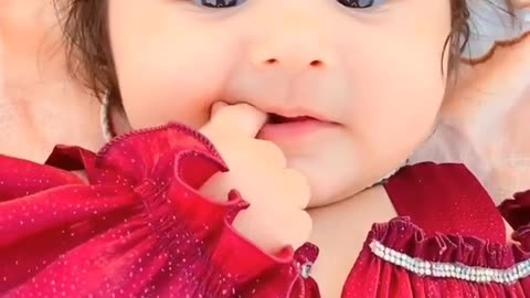 Cute baby in Red dress