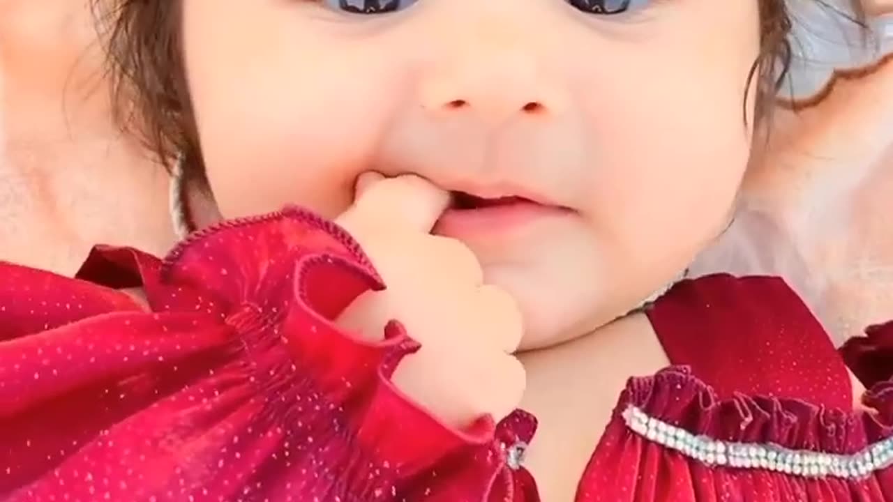 Cute baby in Red dress