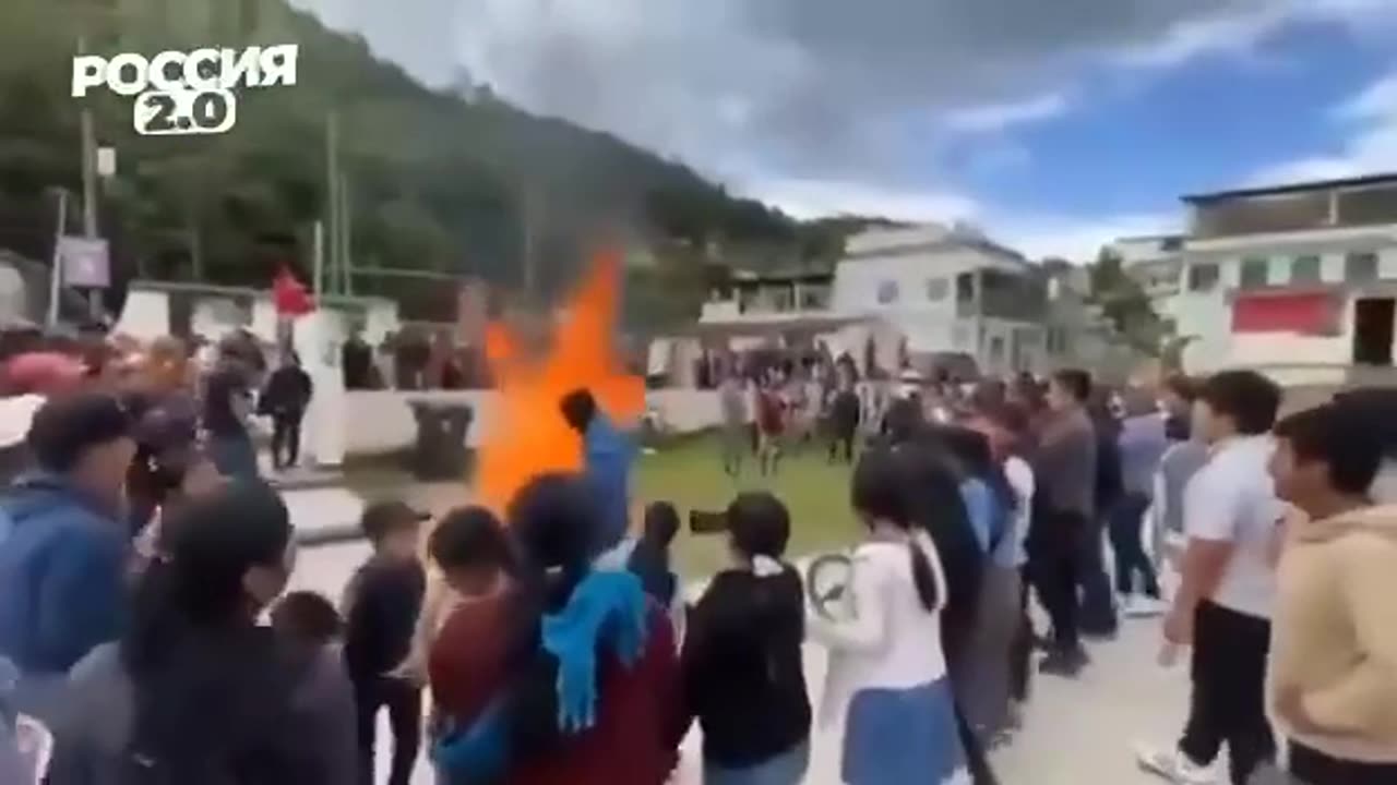 Students and parents in Mexico burn LGBT textbooks.