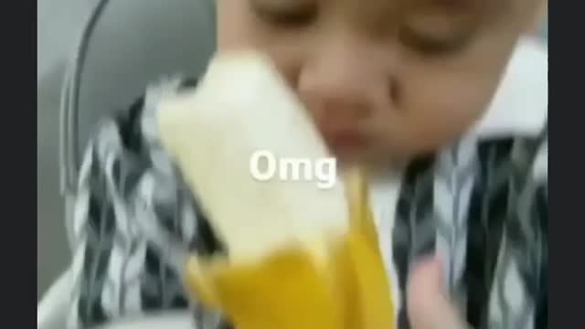 Babies are learning how to eat bananas.
