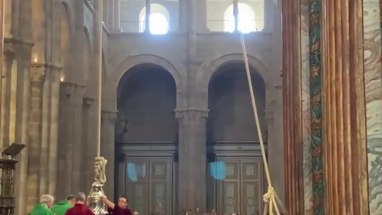 The Botafumeiro (Incense Burner) Swings at the Pilgrim's Mass in St. James Cathedral.