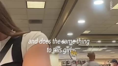 Creepy man sniffs woman at Barnes&Noble