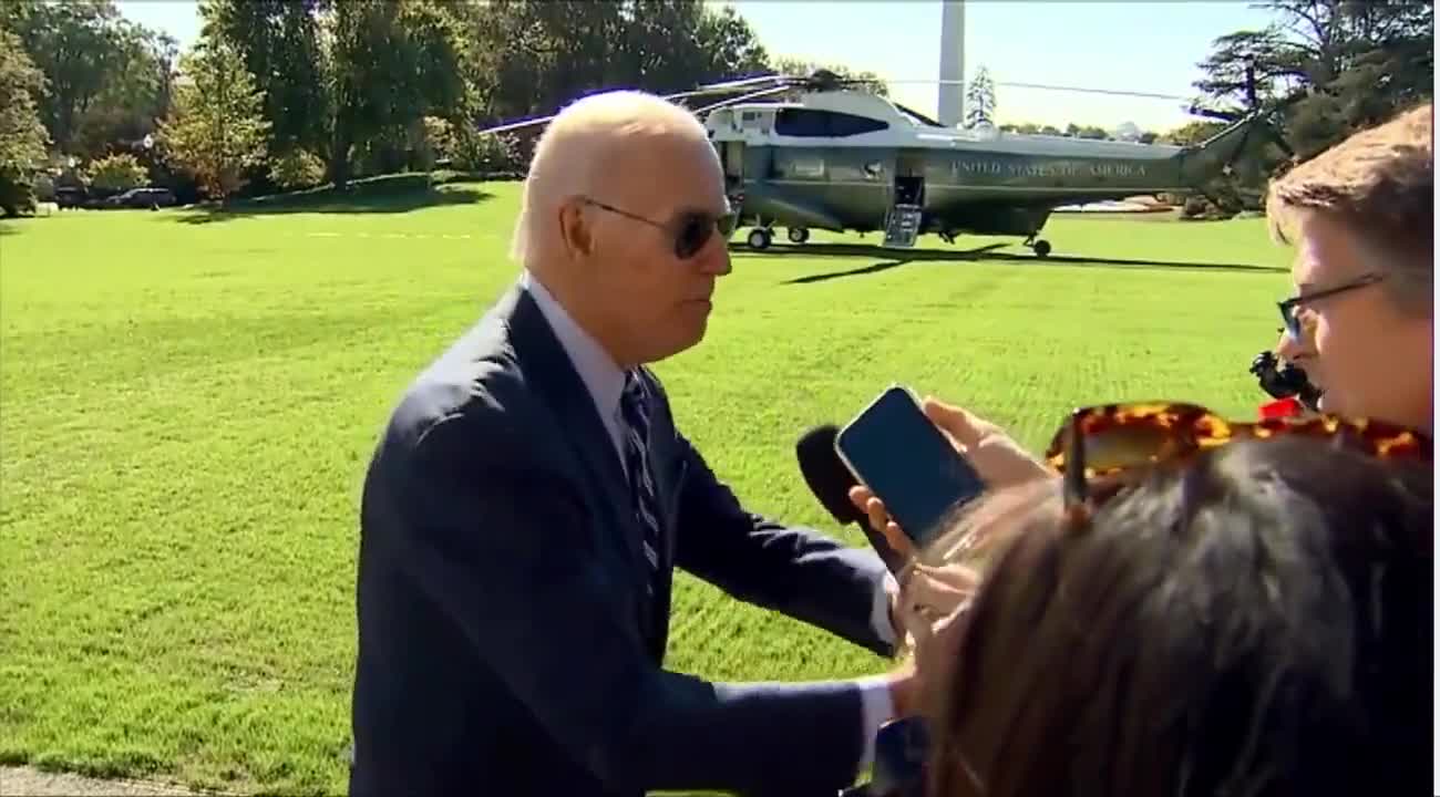 WATCH: Frustrated Biden Grabs Reporter