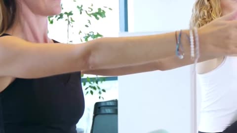 Oblique Roll Back on the Ladder Barrel - Pilates Academy Dubai