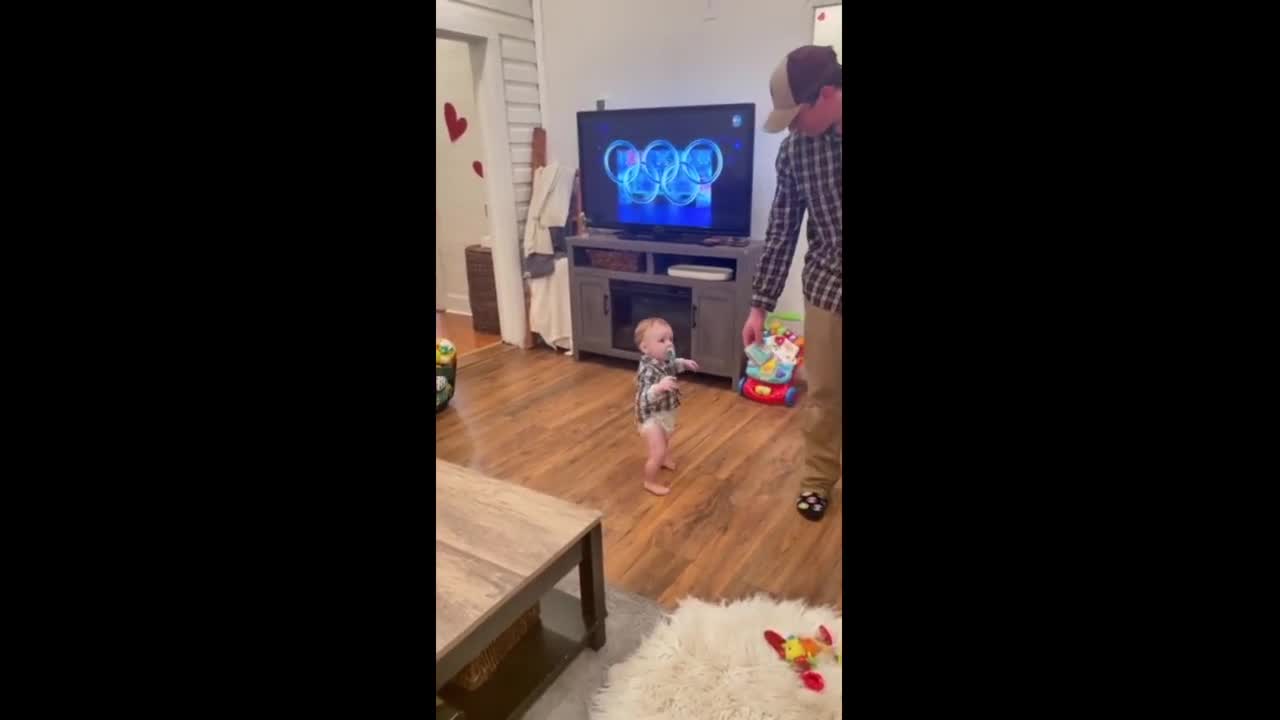 Little girl humorously uninterested in baby brother's first steps #Shorts