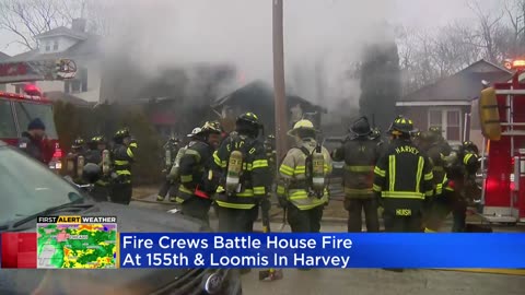 Crews battle house fire in Harvey