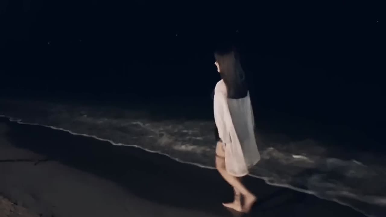 Strolling on the beach at night