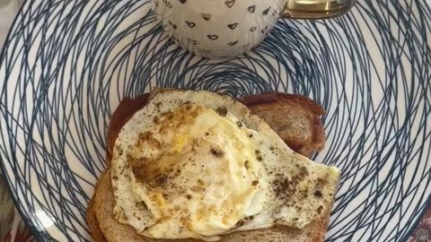 Breakfast tea and bread with egg