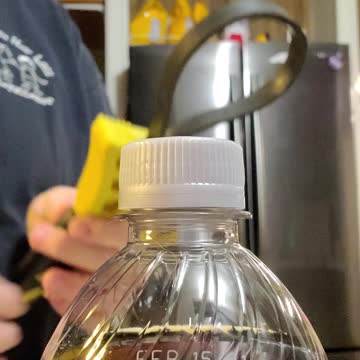 Opening a bottle with bad hands