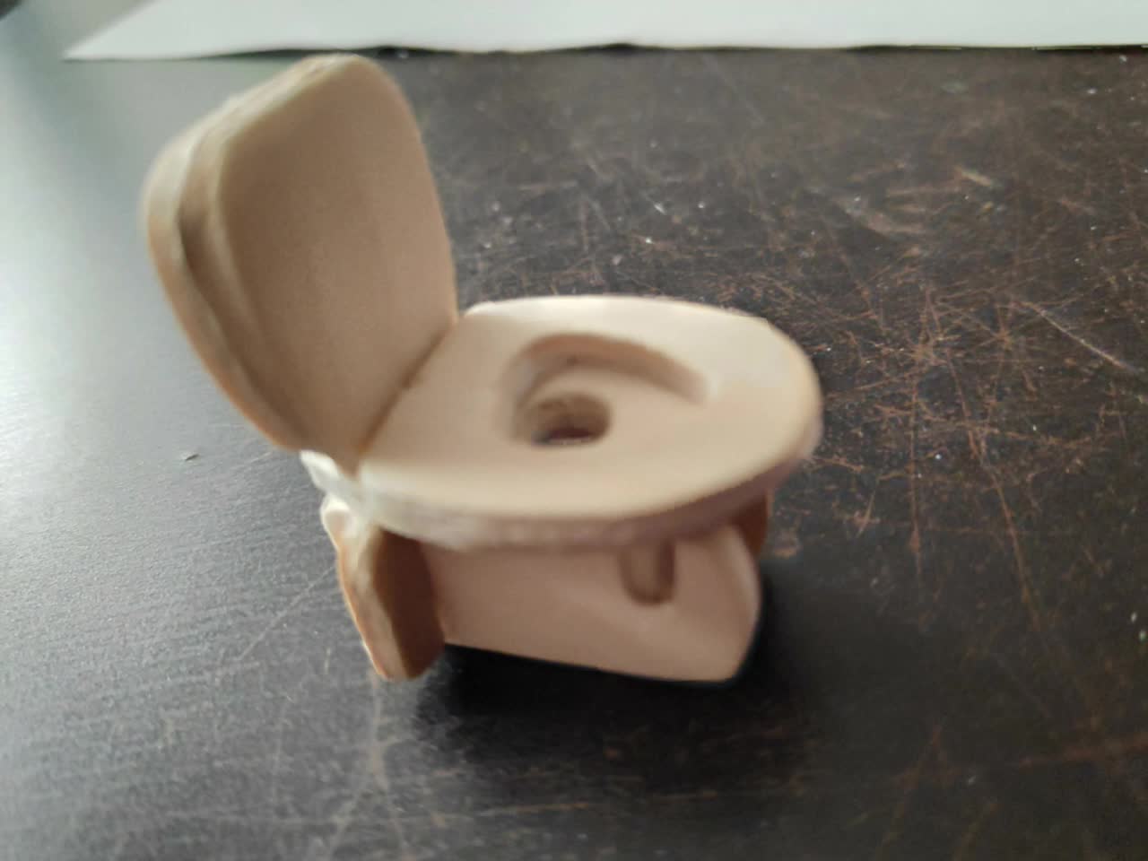 the toilet toy is spinning