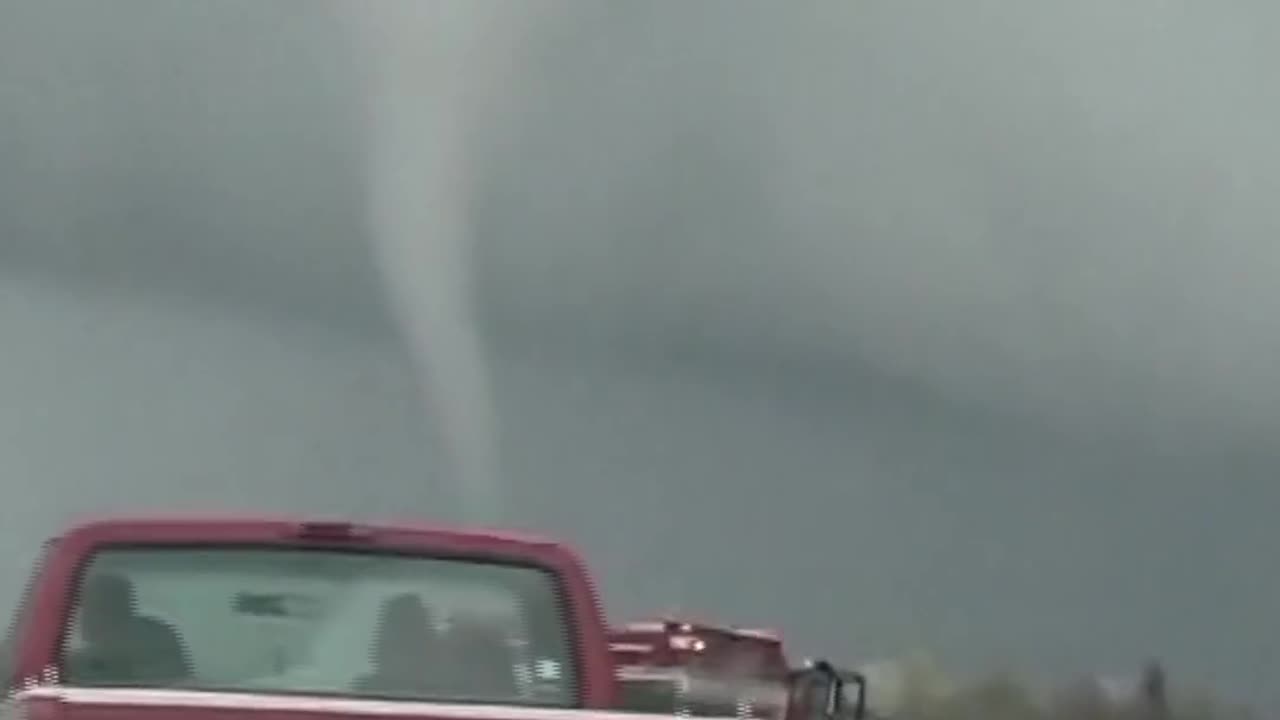 Cars drive by tornadoes tearing across Texas and Nebraska_1080p