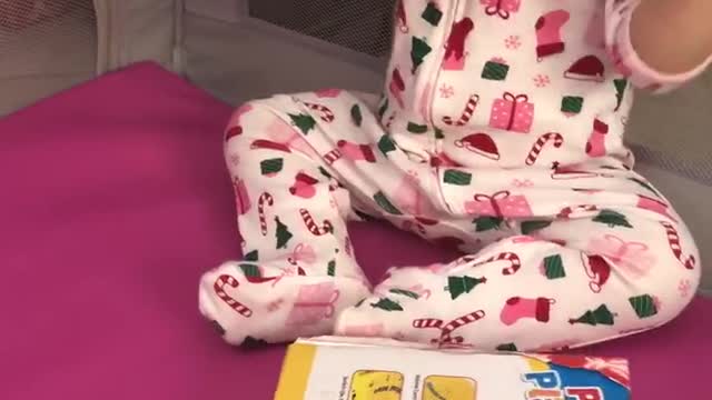 Enjoying her first Christmas morning