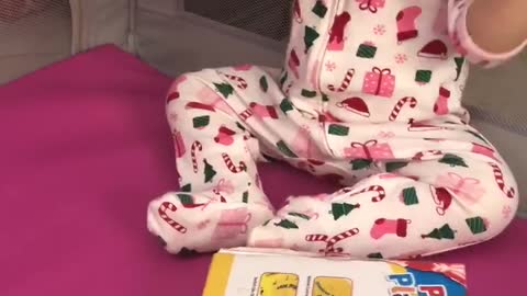 Enjoying her first Christmas morning