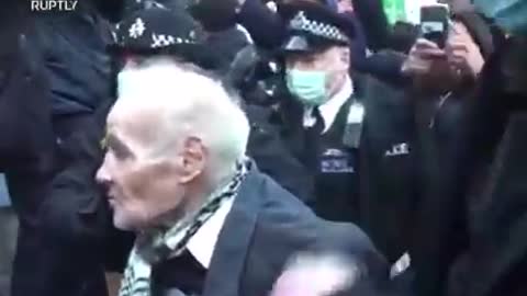 The criminal police is arresting a 92-year old man