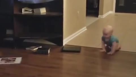 Funny baby with dog at home