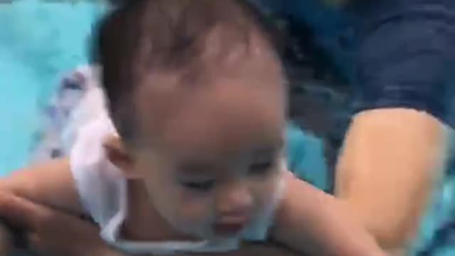 Babies swimming