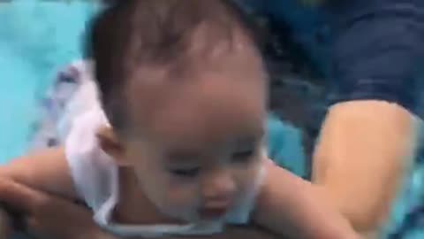 Babies swimming