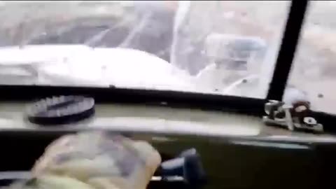 Russian Soldier Tells His Buddy to "No Matter What, Don't Stop Driving."