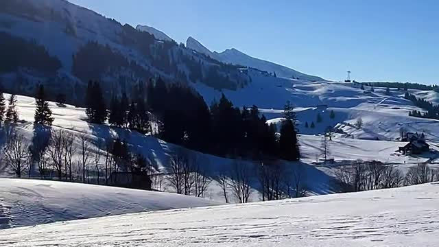 Beautiful scenery of Swiss country snow-capped mountains