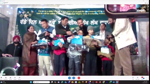 Passing out Shoes and Jackets to orphans in Punjab India for winter