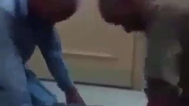 two men fight with head vs head