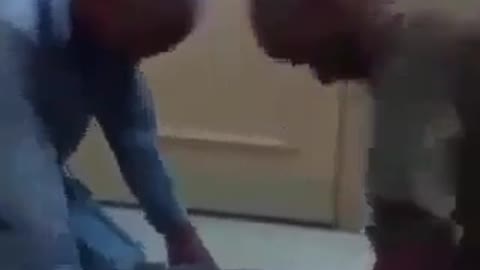 two men fight with head vs head