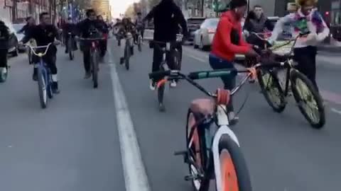 Great acrobatics performed in the middle of the bike lane