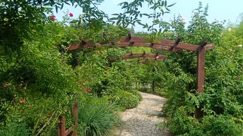 This is an arch bridge made of flowers.