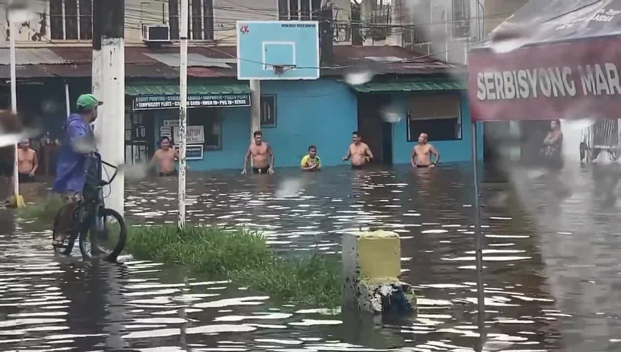 Flood olympics in the Philippines amidst the week-long rain.