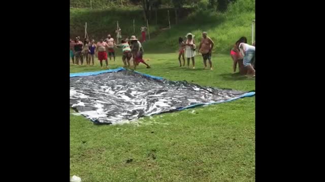 Slip 'N Slide Beer Chug Relay