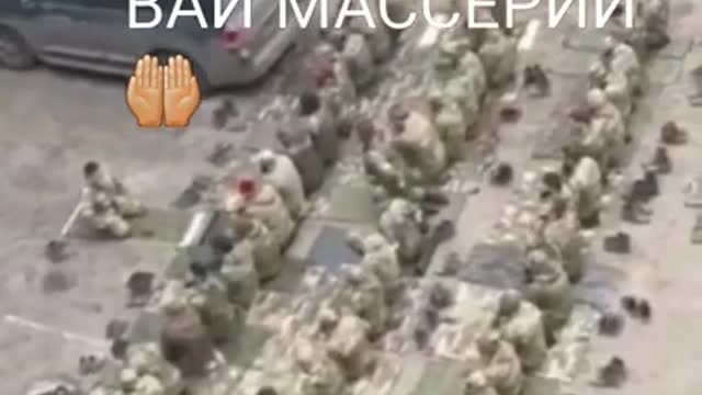 Chechen soldiers make a pray before going to battle